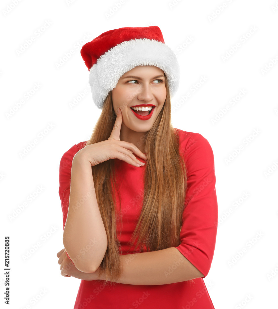 Young beautiful woman in Santa hat on white background. Christmas celebration Young beautiful woman in Santa hat on white background. Christmas celebration