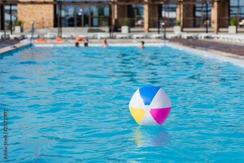 Swimming pool view with inflatable ball