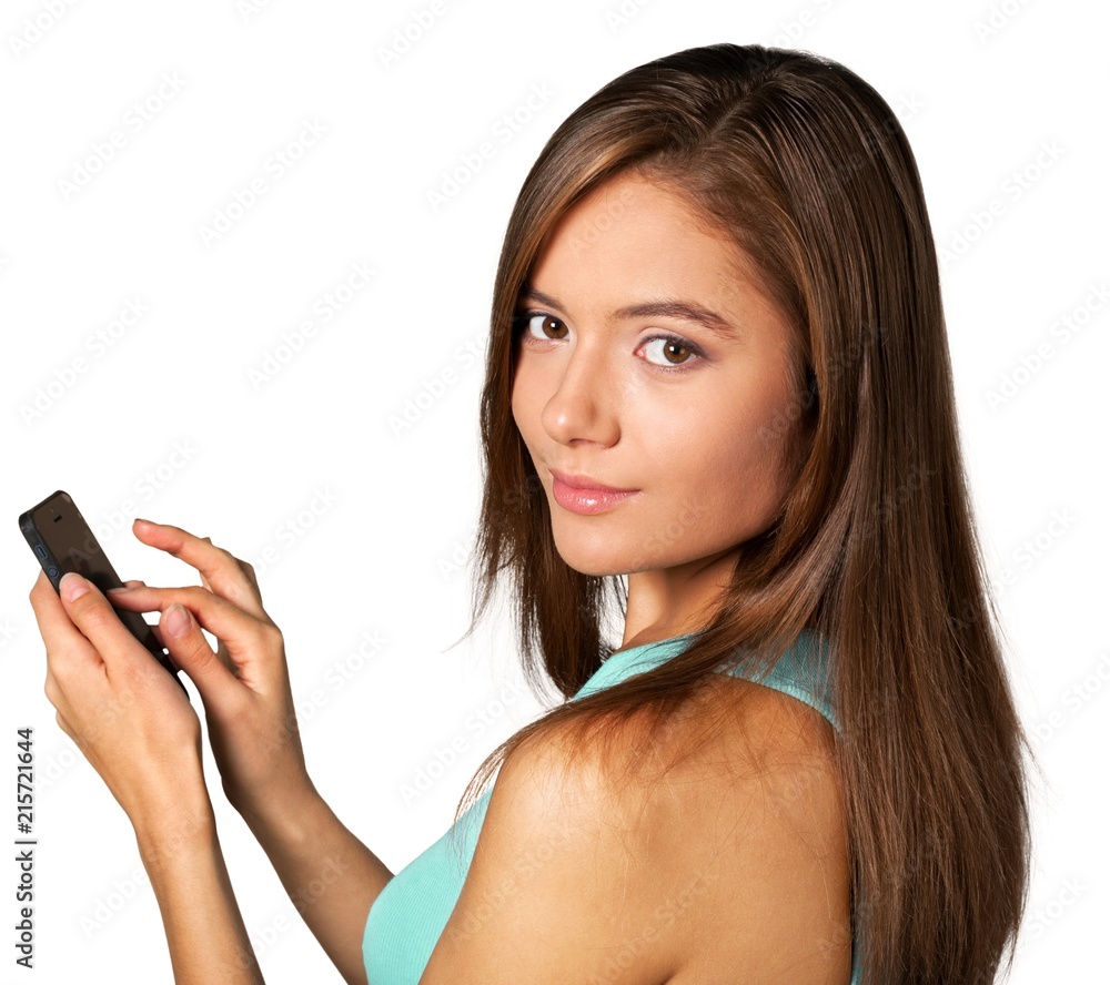 Young cute woman using phone isolated on white background Young cute woman using phone isolated on white background