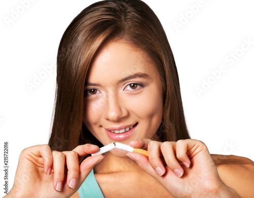 Portrait of a Young Woman Breaking Cigarette