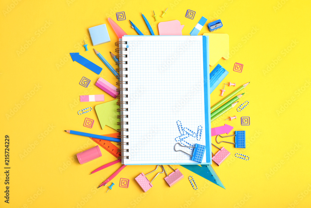Flat lay composition with different school stationery on color background Flat lay composition with different school stationery on color background