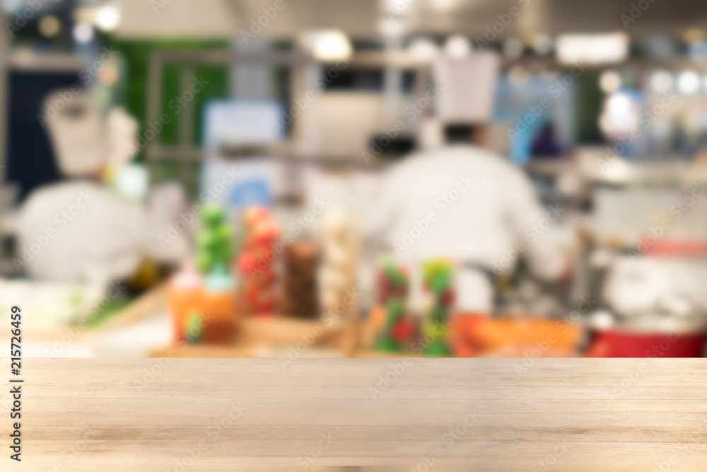 Empty wooden Table with blurred Chef
