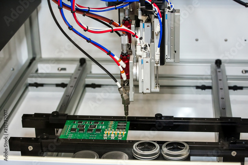 Flexible robotic conformal coating and dispensing system for selective coating potting, bead, and meter-mix dispensing applications photo