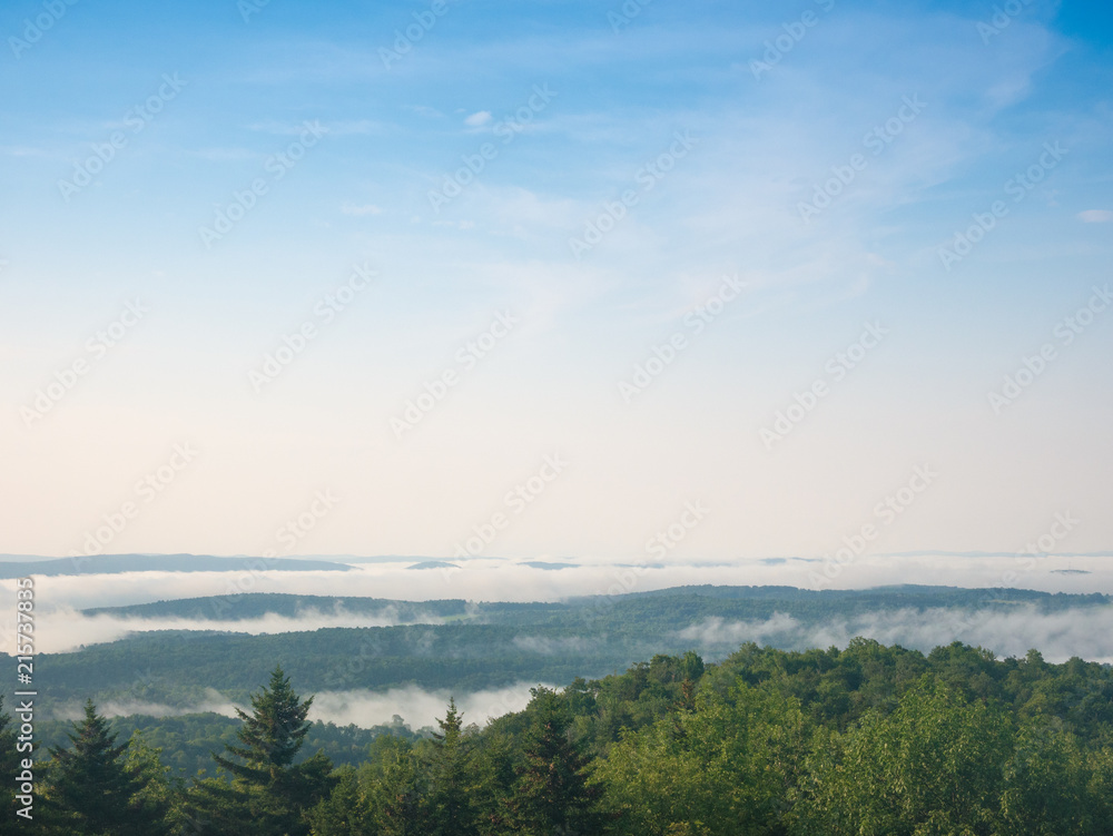 Fog over the hillside of mountain in the morning
