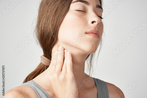 woman with eyes closed toothache