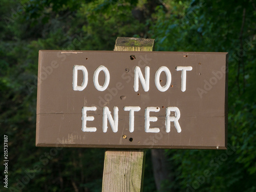 A wooden do not enter sign in a state park, Vermont, USA photo