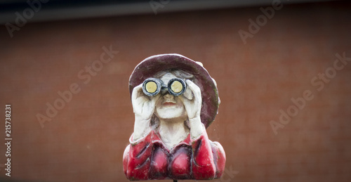 Lady Figure with Binoculars photo