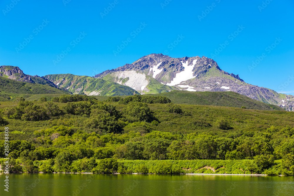 Kurile lake, forest and the hills South Kamchatka Nature Park, Russia