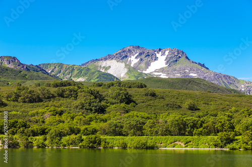 Kurile lake, forest and the hills South Kamchatka Nature Park, Russia