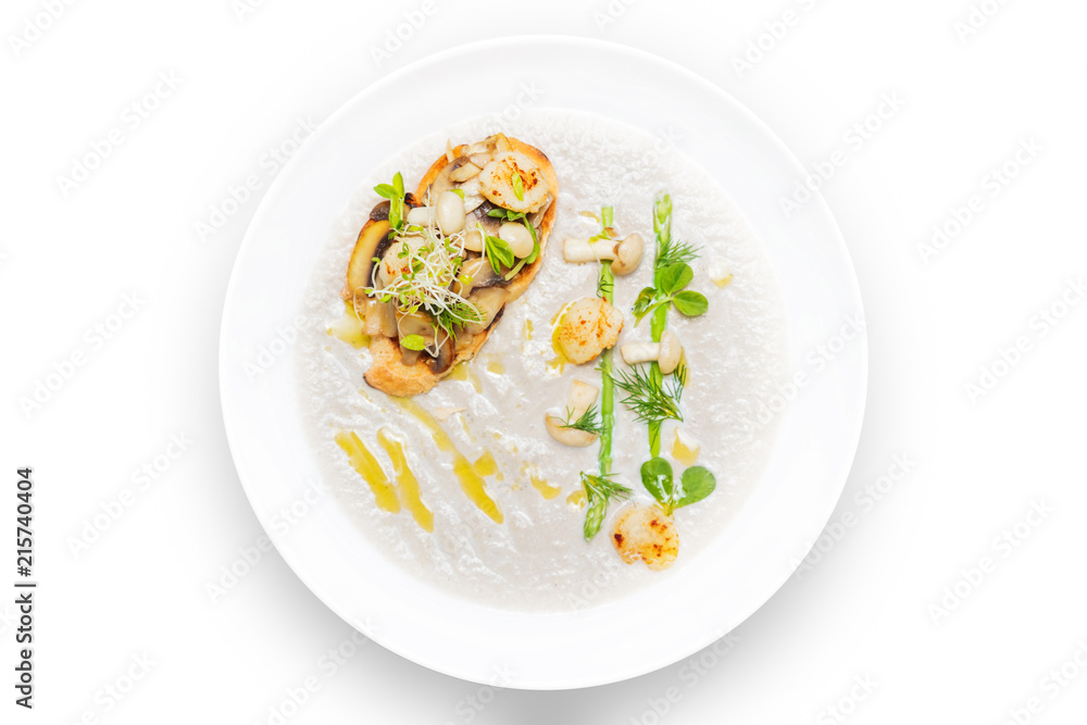 Cream mushroom soup with scallops, herbs and toast bread. Cream mushroom soup with scallops, herbs and toast bread.
