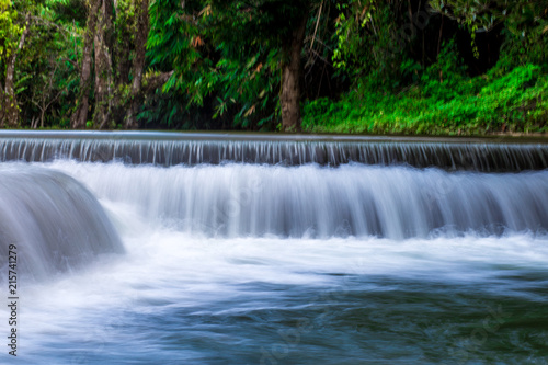 Waterfall, stream is a long way. It is beautiful in nature, often seen by tourists or man-made.