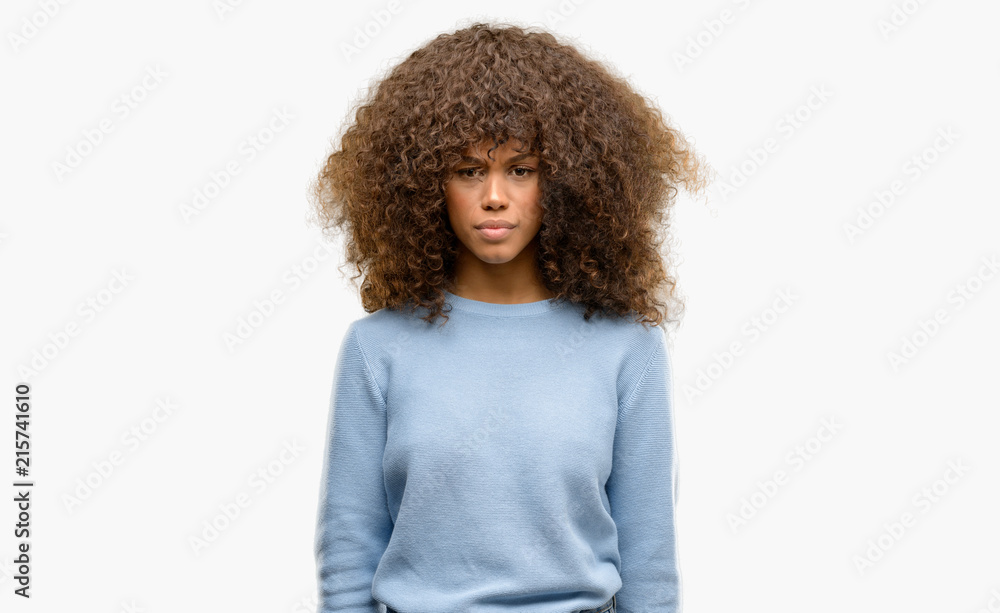 African american woman wearing a sweater skeptic and nervous, frowning upset because of problem. Negative person. African american woman wearing a sweater skeptic and nervous, frowning upset because of problem. Negative person.