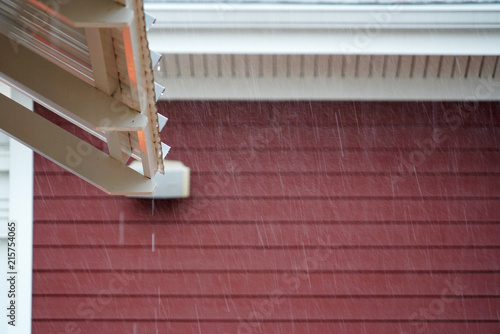 heavy rain and building exterior red wall