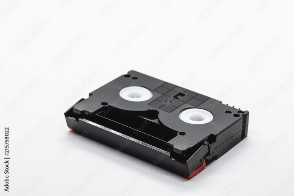 MiniDV format video cassette tape isolated on white background. MiniDV format video cassette tape isolated on white background.