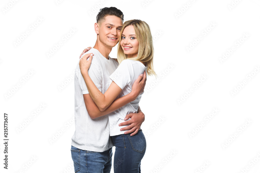 affectionate couple hugging and looking at camera isolated on white affectionate couple hugging and looking at camera isolated on white