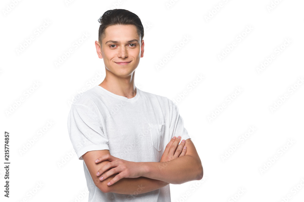 handsome smiling man standing with crossed arms in white shirt isolated on white handsome smiling man standing with crossed arms in white shirt isolated on white