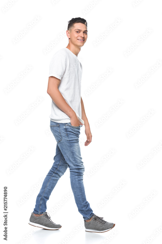 handsome smiling man in white shirt walking isolated on white handsome smiling man in white shirt walking isolated on white