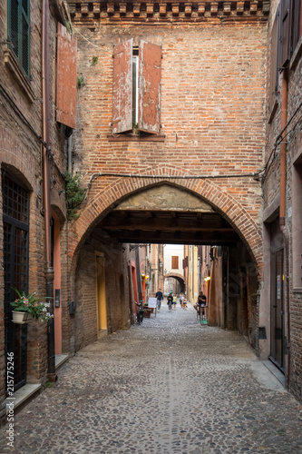 Fototapeta Naklejka Na Ścianę i Meble -  Via delle Volte of Ferrara in the medieval quarter. Emilia-Romagna. Italy.