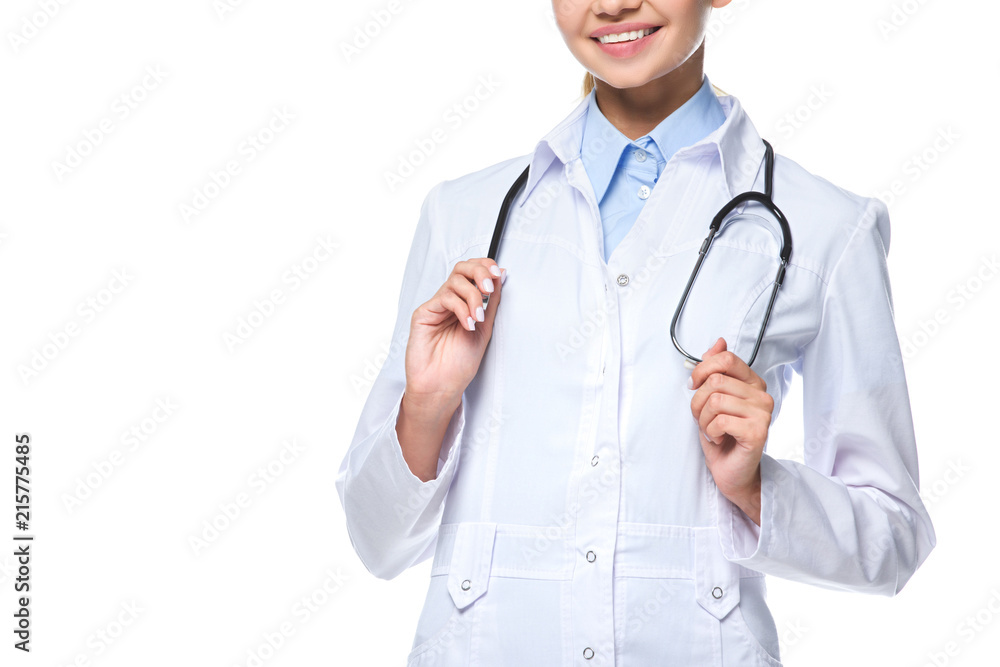 cropped view of female doctor in white coat with stethoscope, isolated on white cropped view of female doctor in white coat with stethoscope, isolated on white