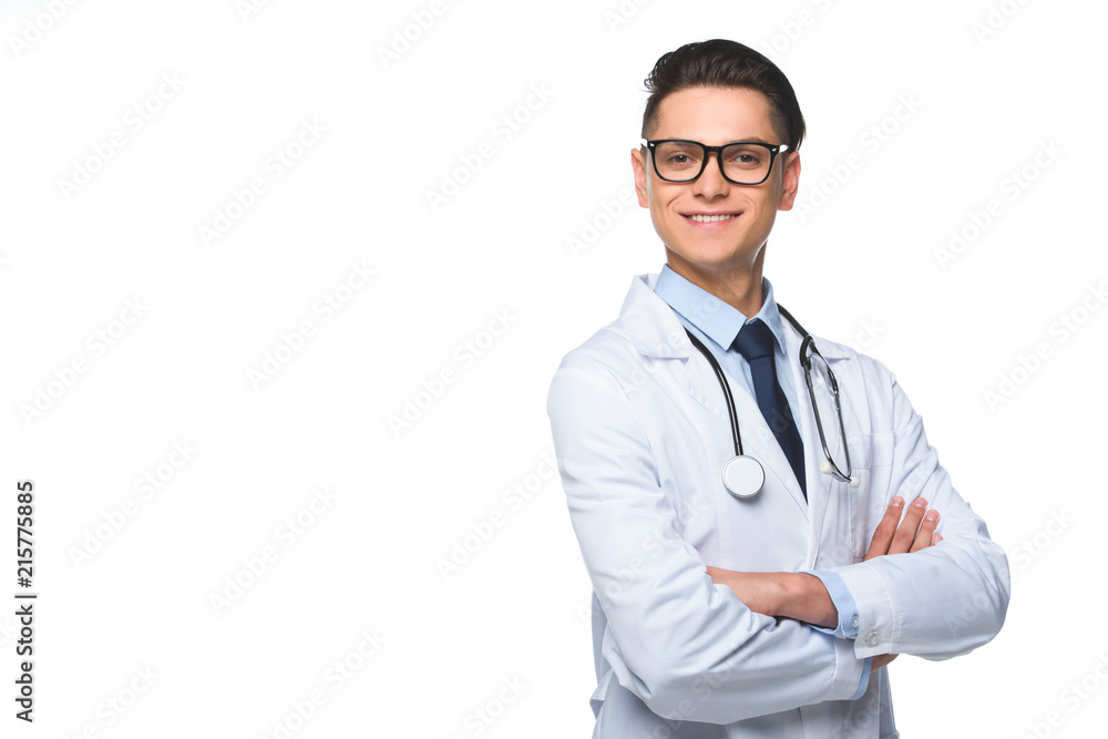 young male doctor in white coat with stethoscope posing with crossed arms, isolated on white young male doctor in white coat with stethoscope posing with crossed arms, isolated on white