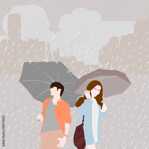 Man with umbrella and women with umbrella on rainy season in the city