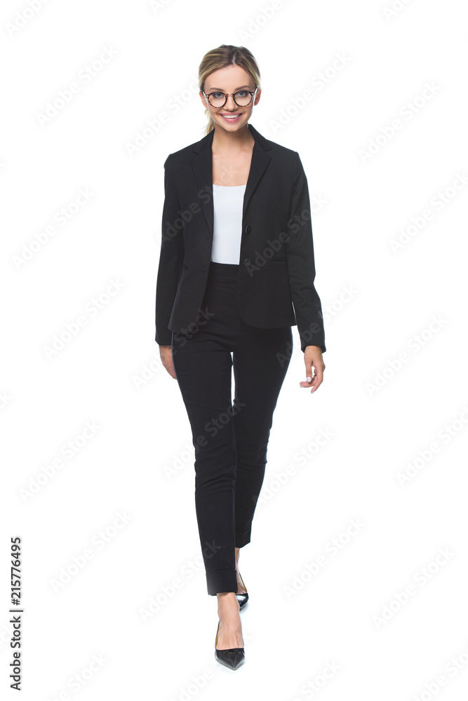 beautiful young businesswoman in stylish suit walking isolated on white beautiful young businesswoman in stylish suit walking isolated on white