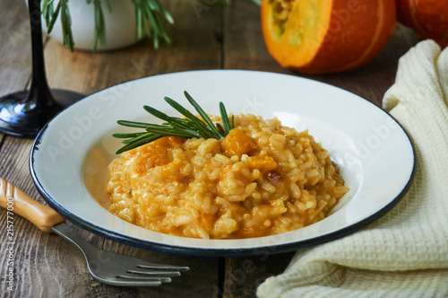Risotto with pumpkin and rosemary in a bowl