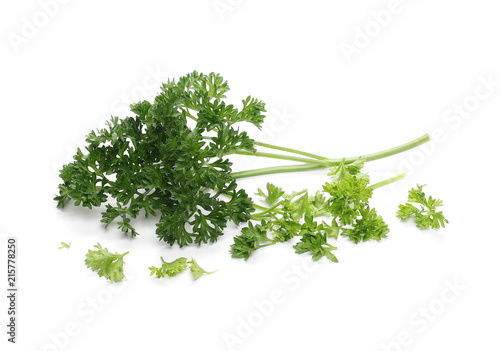 Fresh green parsley leaves isolated on white background