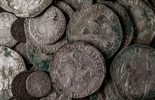 Closeup view of medieval European silver coins. Suitable for an abstract background.