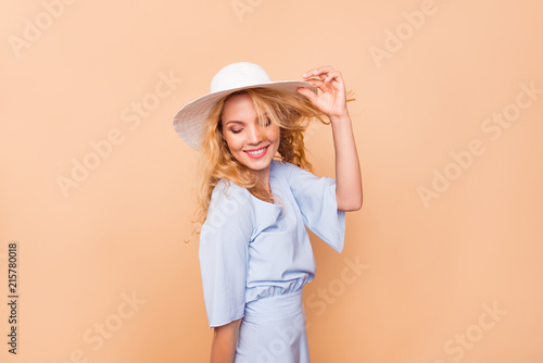 Soft ideal perfect flawless natural beauty people person fun joy concept. Studio photo portrait of pretty attractive nice fancy glad touching hat looking down isolated on bright vivid color background