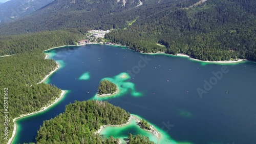 4K scenic flight of Eibsee in Bavaria on the bottom of Zugspitze the highest mountain in germany