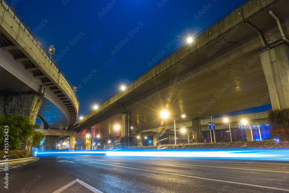 the light trails on the modern building background.