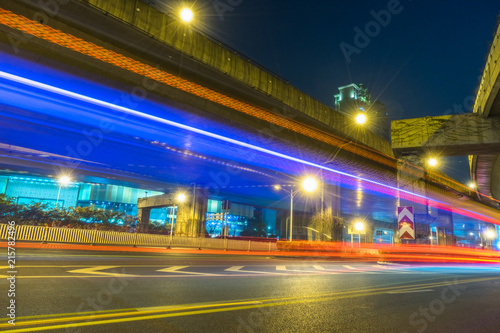 the light trails on the modern building background.