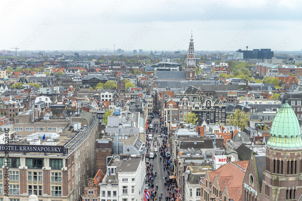 AMSTERDAM, THE NETHERLANDS - MARCH 2015: Aerial view of city buildings. The city hosts 15 million tourists annually
