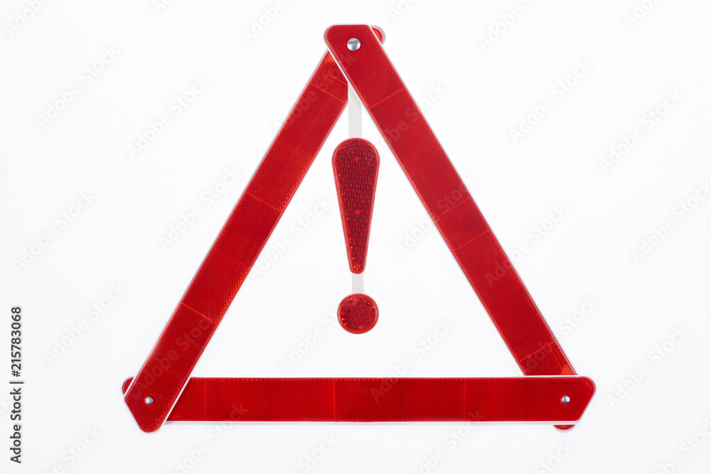 top view of red warning triangle road sign isolated on white top view of red warning triangle road sign isolated on white