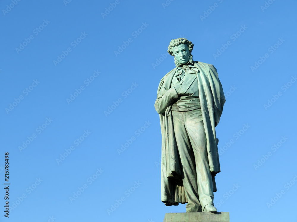 Monument to famous russian writer and poet Alexander Pushkin in Moscow, isolated on clear blue sky background. Russian landmark built in 1880 Monument to famous russian writer and poet Alexander Pushkin in Moscow, isolated on clear blue sky background. Russian landmark built in 1880