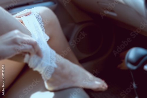 Photos Young lady pull her panty liner while sitting in a car - sex in car dangerous dr