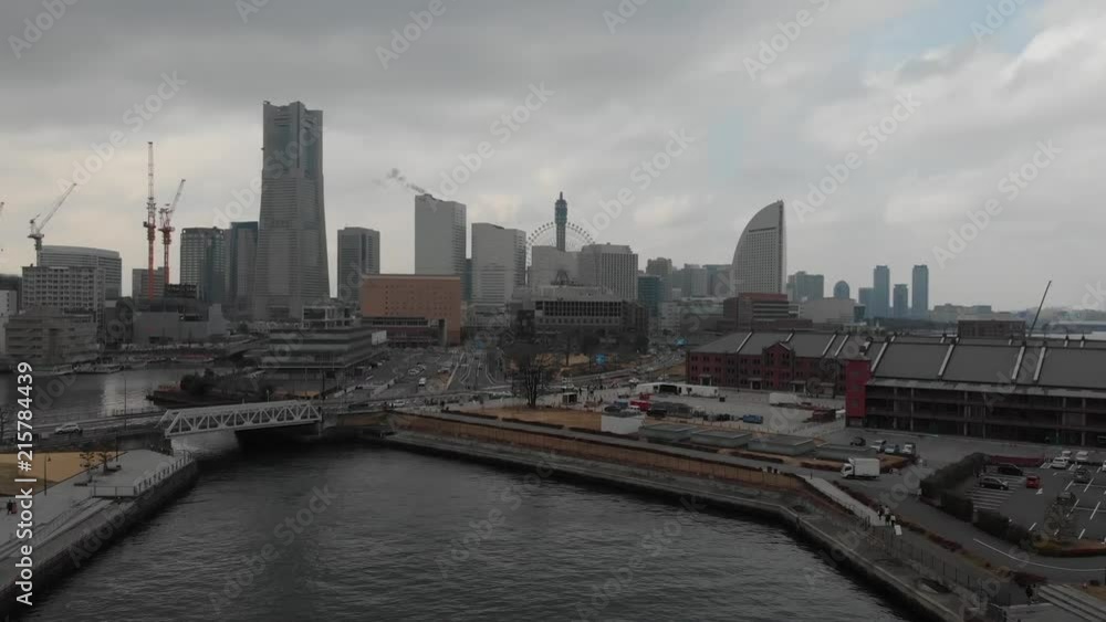 Flying over Yokohama port with views of the city skyline Flying over Yokohama port with views of the city skyline