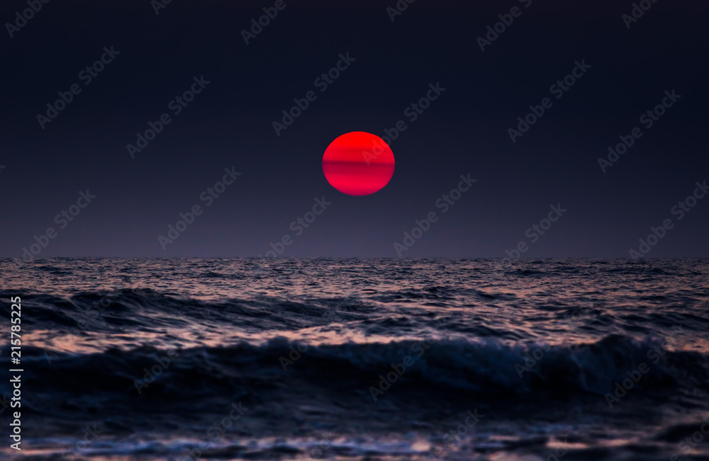 Beautiful dark sunset above the sea Beautiful dark sunset above the sea