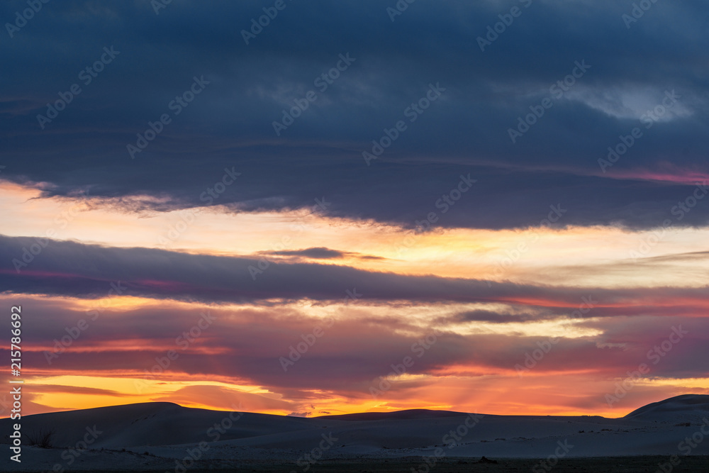 picturesque view of beautiful sunset sky over mountain silhouettes 