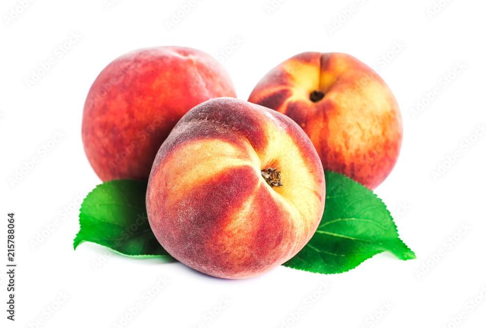 Peach fruit half with leaf isolated on white background Peach fruit half with leaf isolated on white background