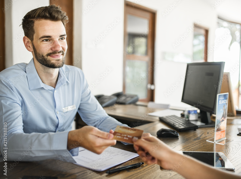 Guests checking in to a hotel