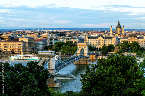 Chain bridge on Danube river in Budapest city. Hungary. Urban landscape panorama with old buildings and domes of opera © Sergii