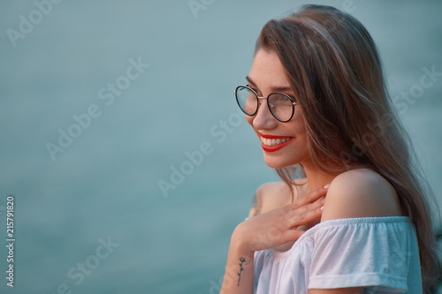 Portrait shiny positive girl with irresistible smile photo