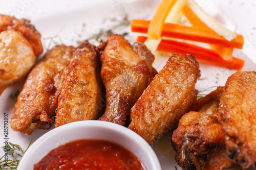 Hot and spicy hot meat dishes. Buffalo Grilled chicken wings with red spicy sauce