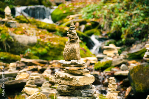 Balancing rock pile in zen style, typical of buddhist meditation, erected near a torrent in Nepal.