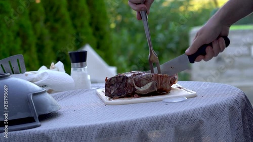 4K footage of ribeye steak grilling and slicing