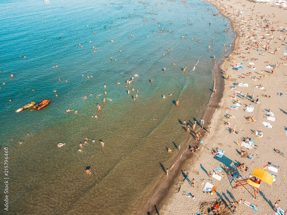 Aerial Drone View Of People Having Fun And Relaxing On Beach Aerial Drone View Of People Having Fun And Relaxing On Beach