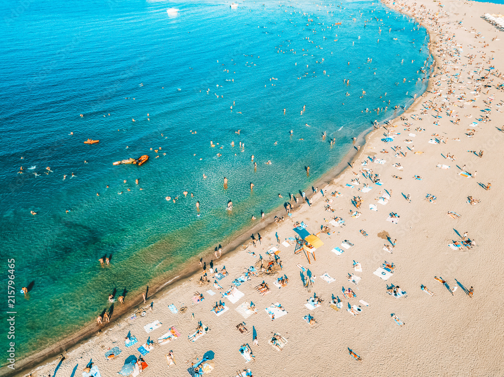 Aerial Drone View Of People Having Fun And Relaxing On Beach Aerial Drone View Of People Having Fun And Relaxing On Beach