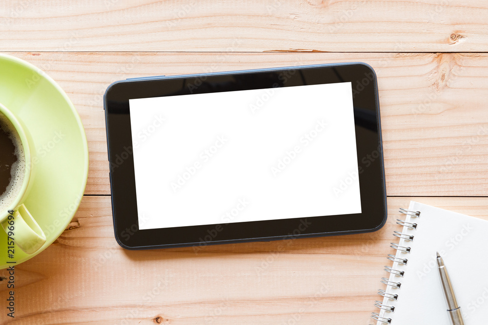 tablet computer with blank white screen on wooden background tablet computer with blank white screen on wooden background